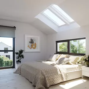 VELUX smart skylight installed above a bedroom