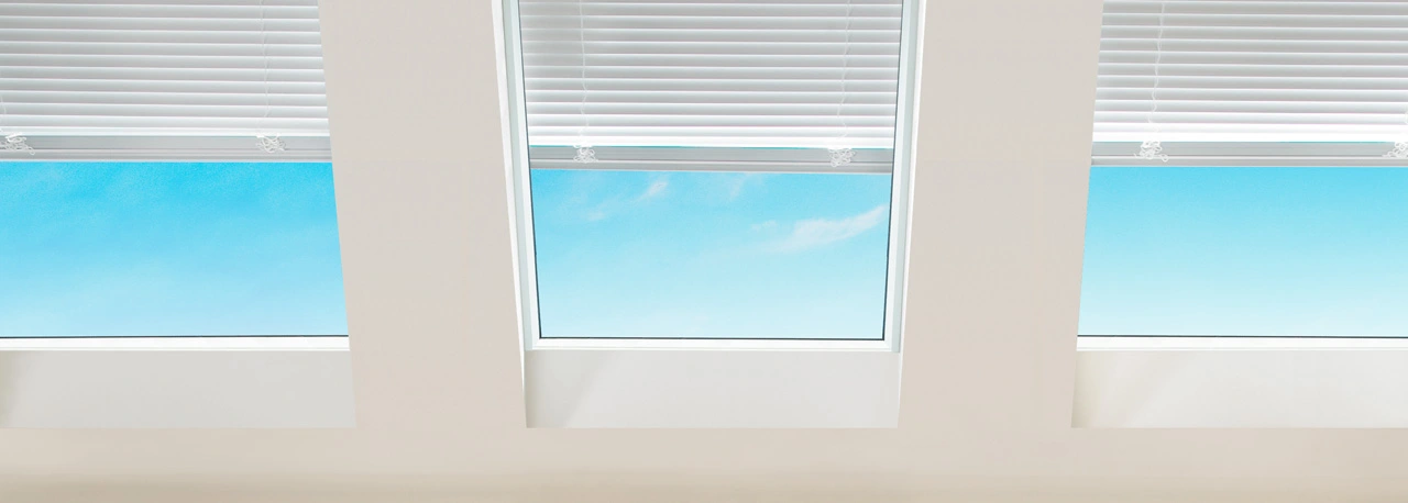 venetian-blinds-hero Venetian style skylight blinds installed in a room